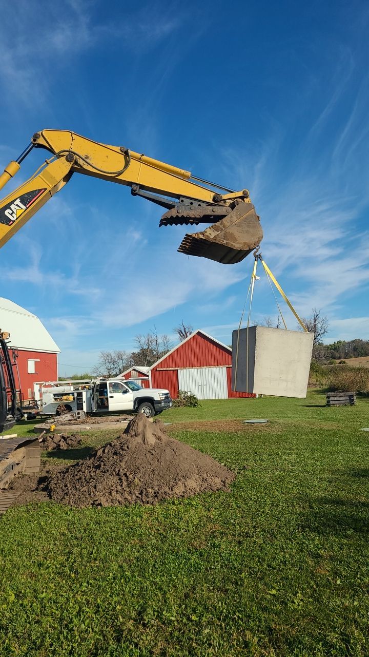 excavating-machine-lifting-a-concrete-material