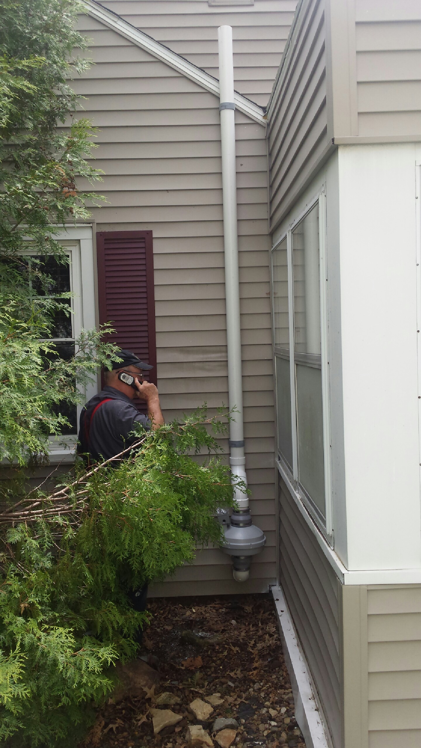 contractor-checking-the-radon-fan
