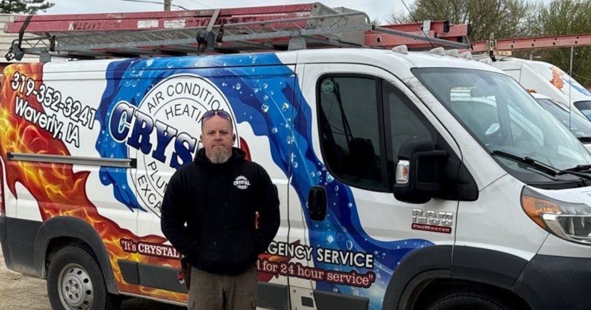 crystal-employee-beside-the-working-vehicle