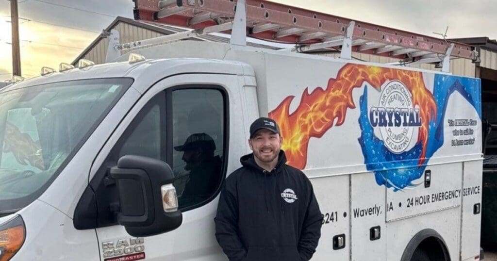 crystal-employee-beside-the-vehicle