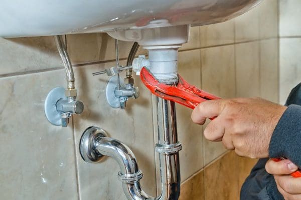 plumber-fixing-the-bathroom-sink