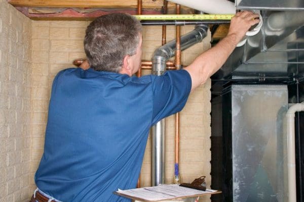plumber-inspecting-pipes